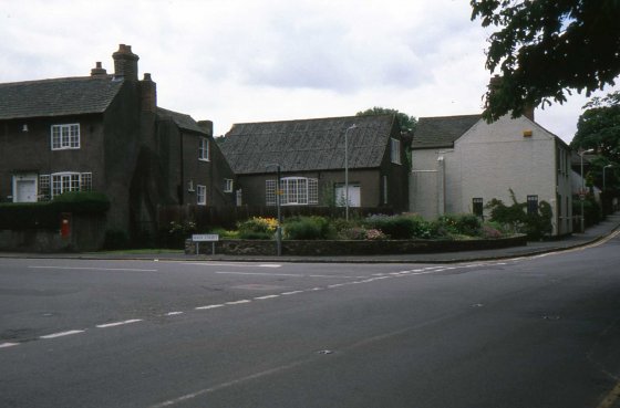 T32a  Corner of Main Street flower beds